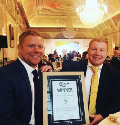 Tom and Ed Armstrong with their Best Pork Sausage in the East Midlands winners plaque at British Sausage Awards 2018
